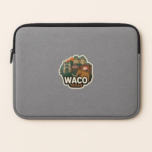 a gray laptop sleeve with a sticker of a cityscape and the text "Waco, Texas" printed on it.