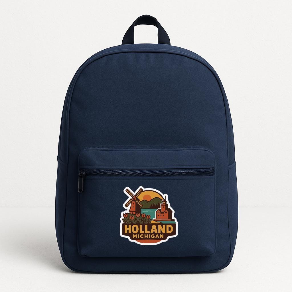 A navy blue backpack with a sticker on the front that says "Holland Michigan".
