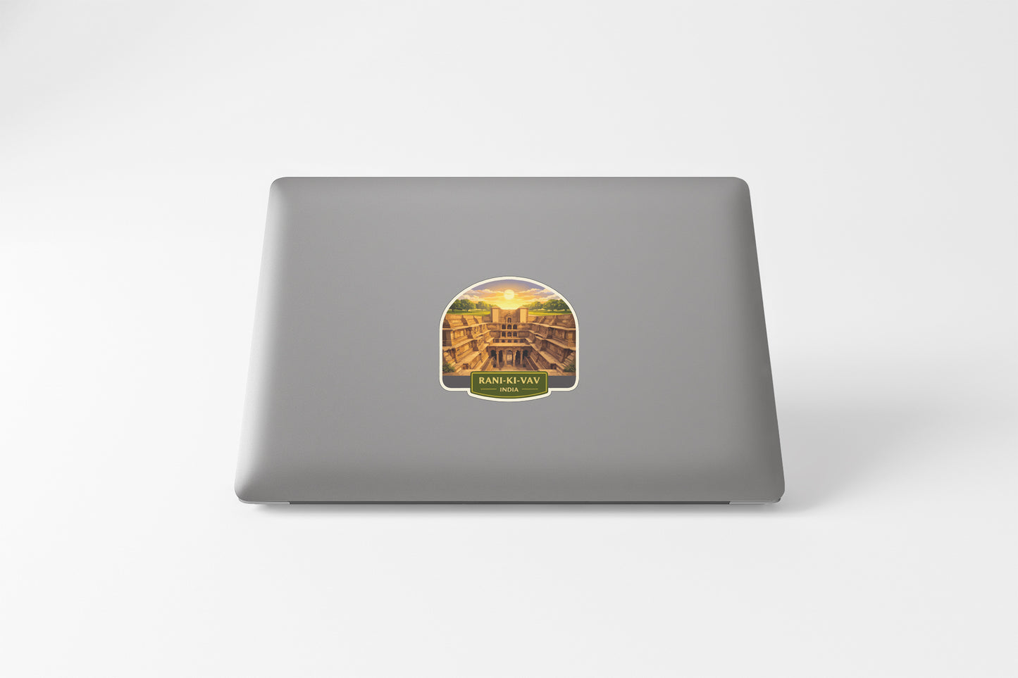 a sticker with a picture of a temple on a laptop.