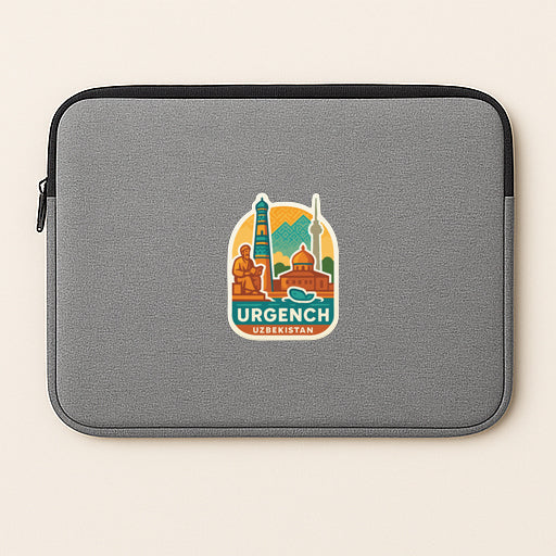 A gray laptop sleeve with a sticker of Urgench, the capital city of Uzbekistan, printed on it.