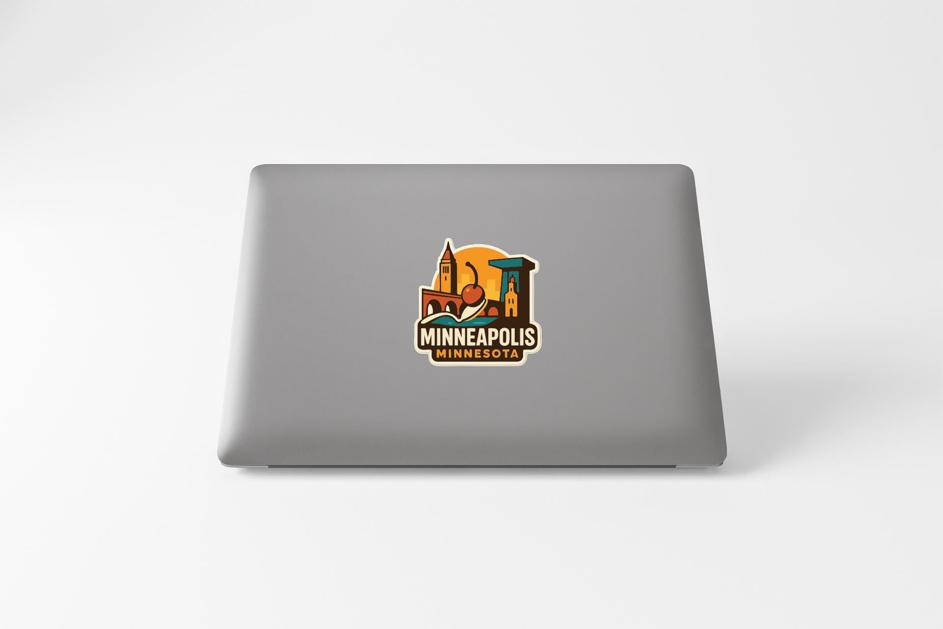 a sticker with the text "MINNEAPOLIS MINNESOTA" and an illustration of a city skyline.