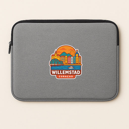 A gray laptop sleeve with a colorful sticker depicting the city of Willemstad, Curacao, printed on it.