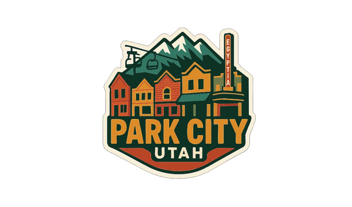 A colorful sticker or emblem featuring the text "PARK CITY UTAH" surrounded by various landmarks and buildings, including a ski lift and a theater.
