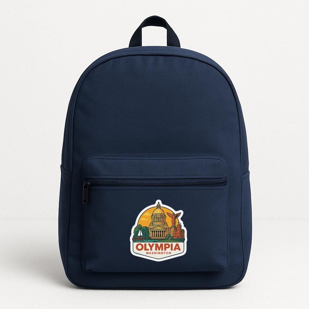 A navy blue backpack with a sticker on the front that says "Olympia Washington".