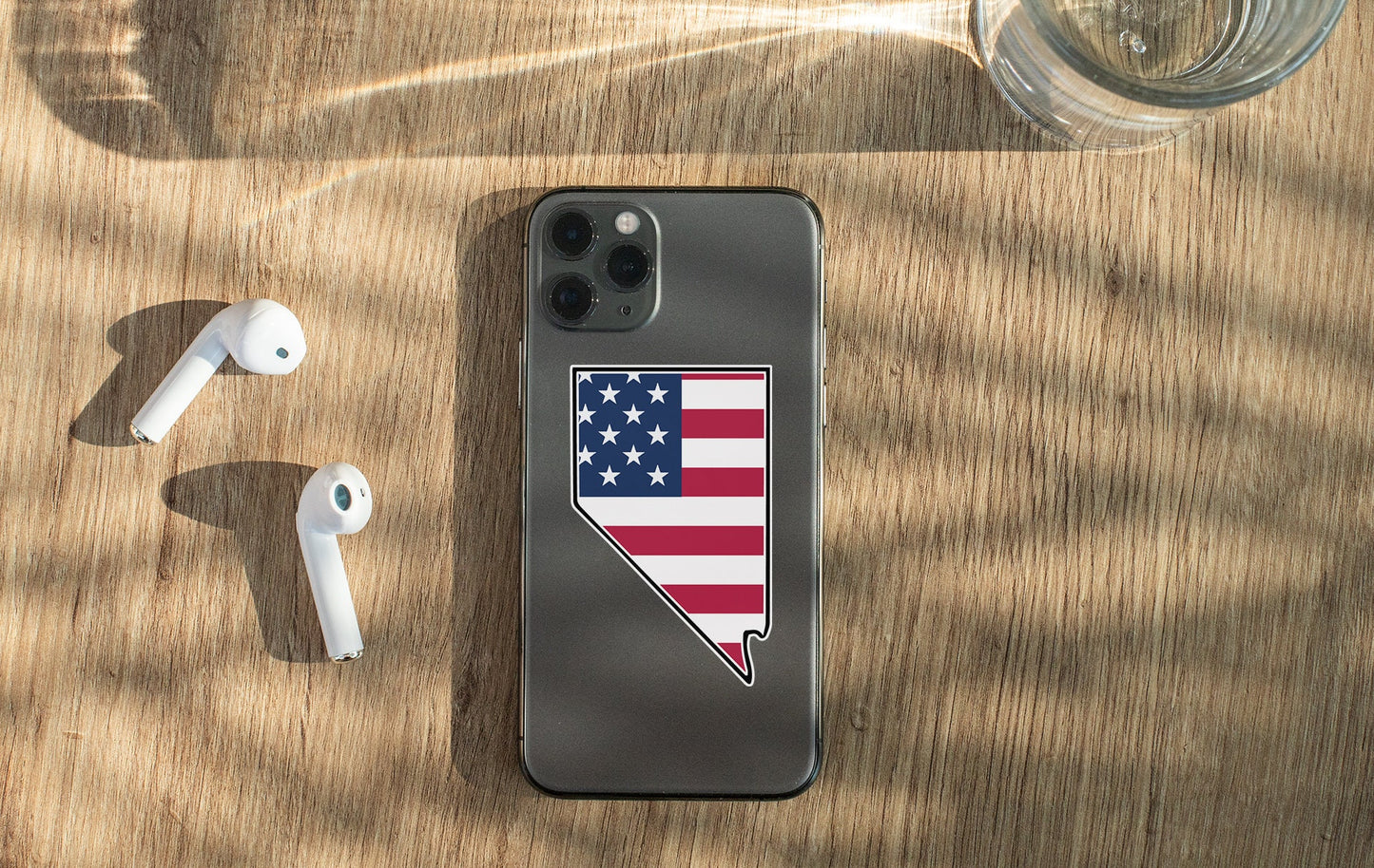 a cell phone with a sticker of the state of arizona on it