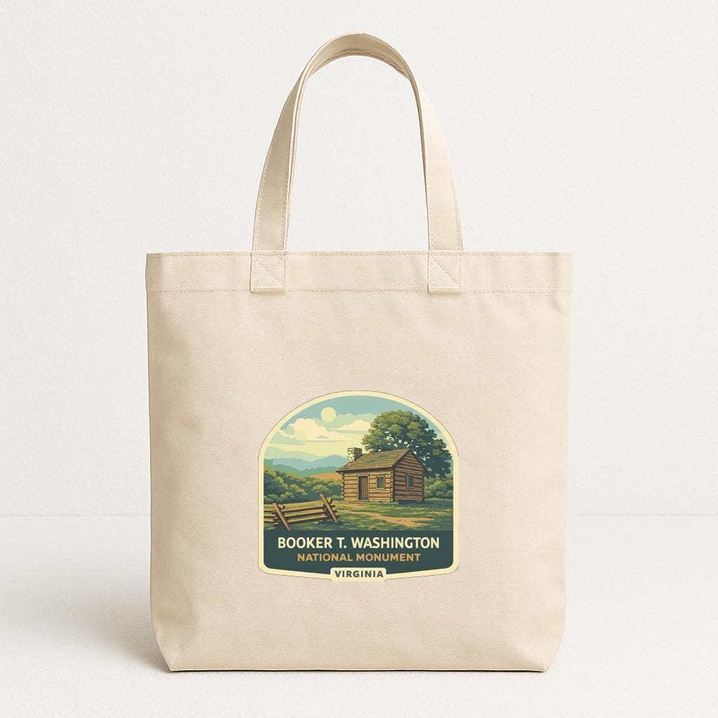 A beige tote bag with a printed label that says "BOOKER T. WASHINGTON NATIONAL PARK MUSEUM VIRGINIA".
