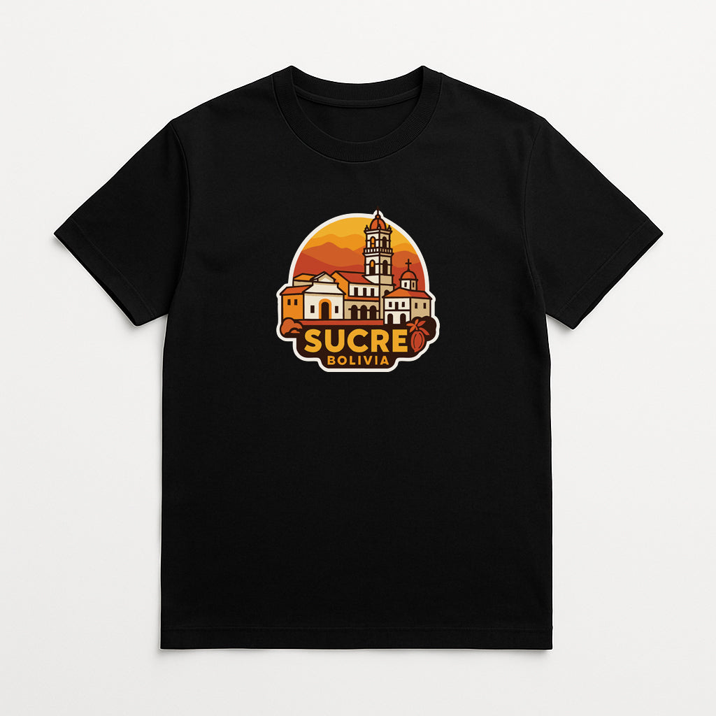 A black t-shirt with a graphic design depicting a cityscape with a tower and buildings, along with the text "SUCRE BOLIVIA" printed on it.