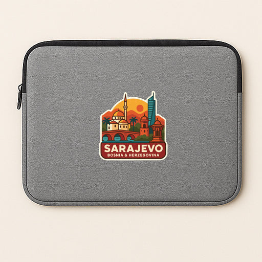 A gray laptop sleeve with a sticker depicting the skyline of Sarajevo, Bosnia and Herzegovina.