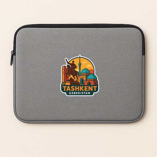 a gray laptop sleeve with a colorful graphic of Tashkent, Uzbekistan, including a statue and a building.