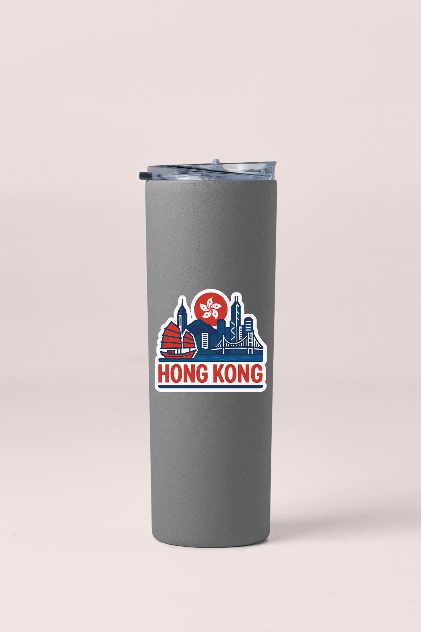 a stainless steel tumbler with the hong kong skyline on it