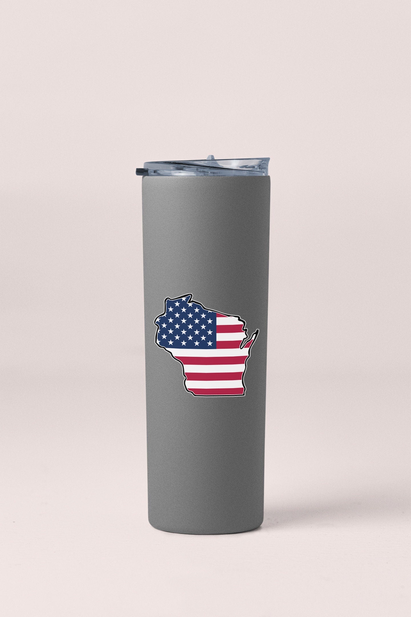 a gray tumbler cup with an american flag in the shape of the state of
