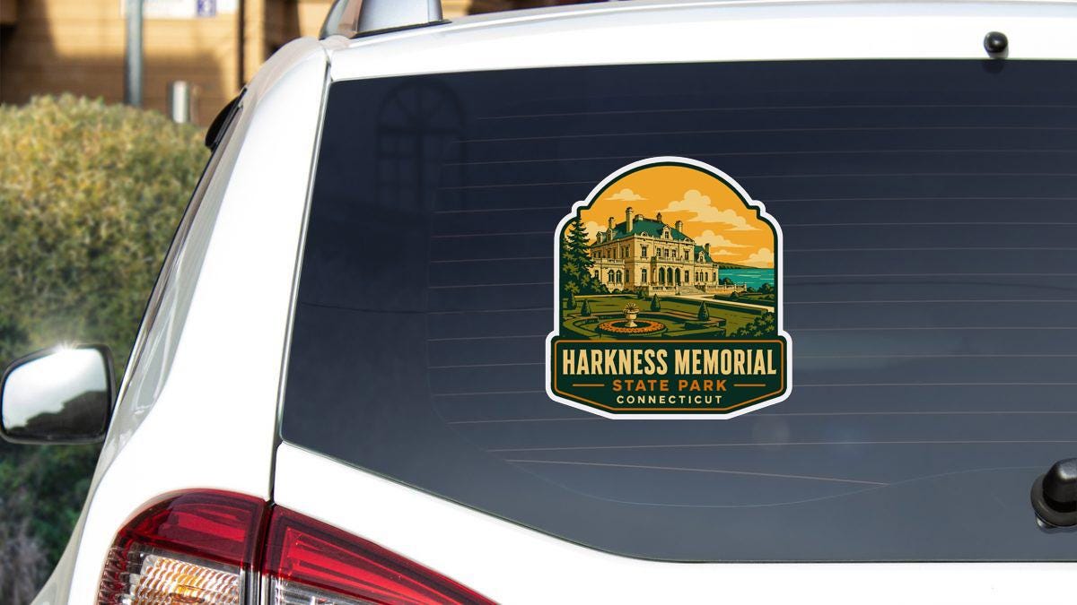 A sticker on the rear window of a car that says "HARKNESS MEMORIAL STATE PARK CONNECTICUT".