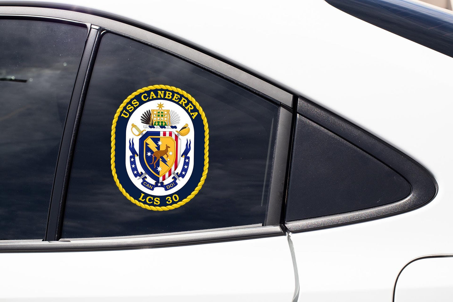a close up of a car window with a badge on it