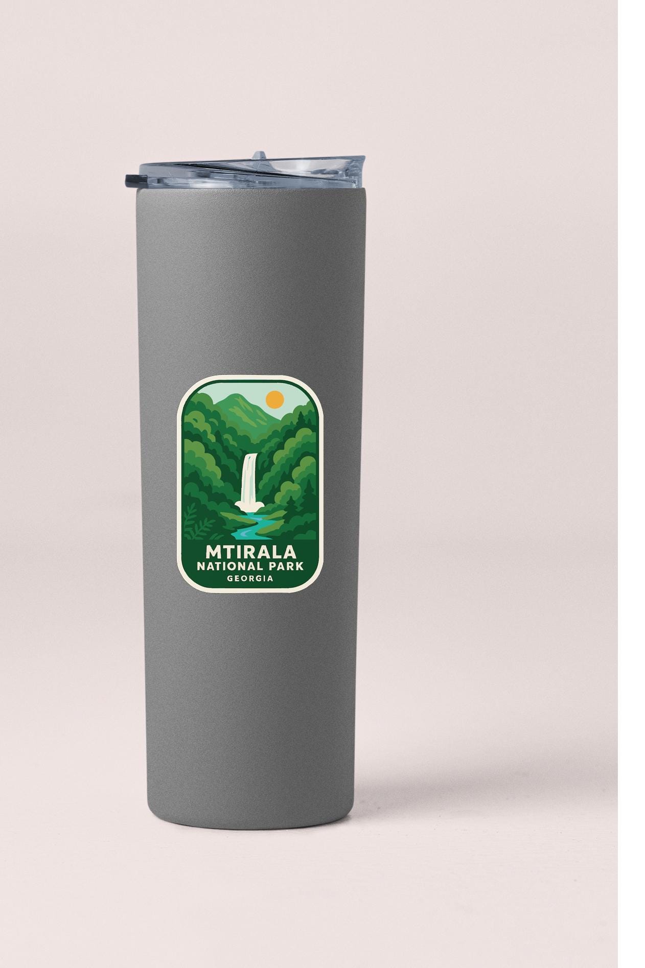 A gray insulated tumbler with a label that says "MTIRALA NATURAL PARK GEORGIA".