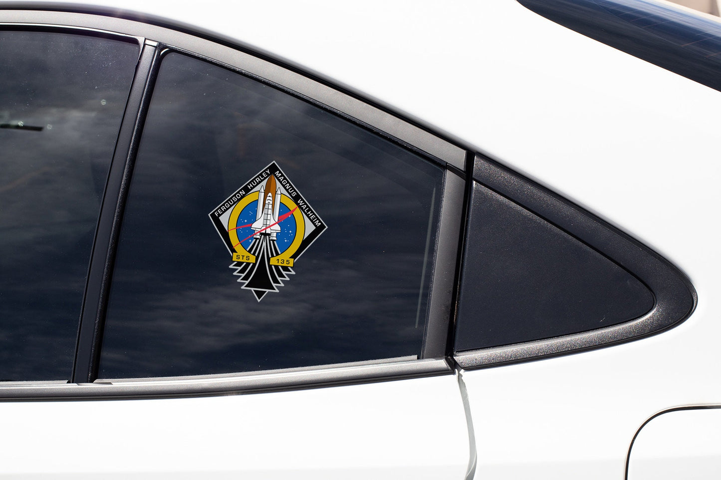 a white car with a sticker on it's side window