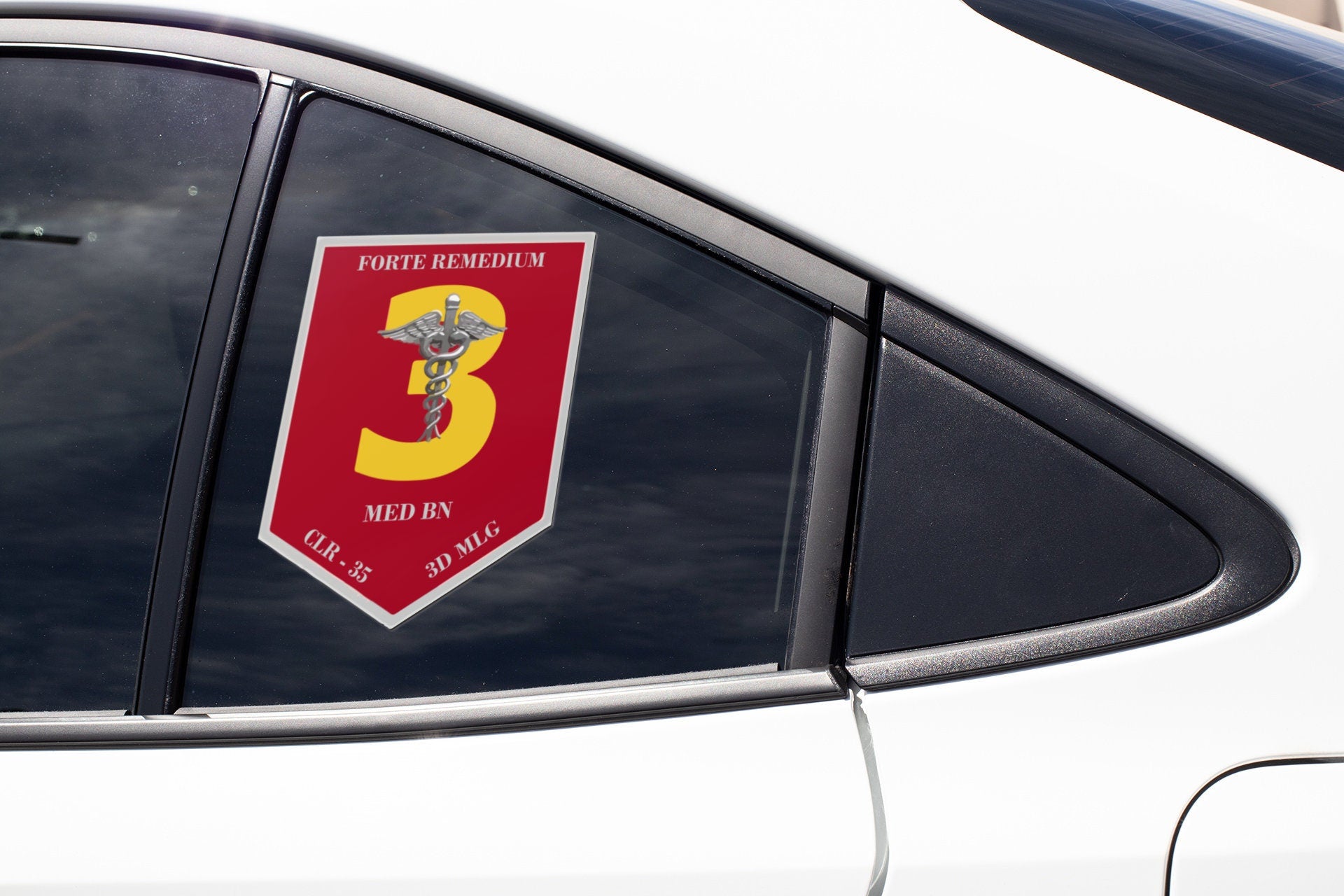 a close up of a car window with a sticker on it