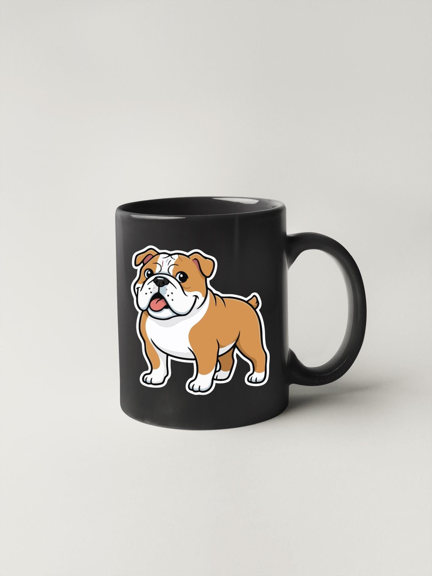 A black coffee mug with a cartoon illustration of a bulldog on it.