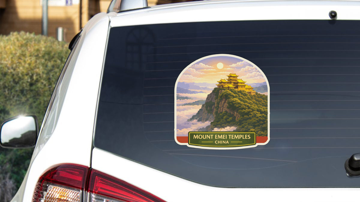 a sticker on the rear window of a car that depicts a temple on a mountain, with the text "Mount Emei Temples China" below it.
