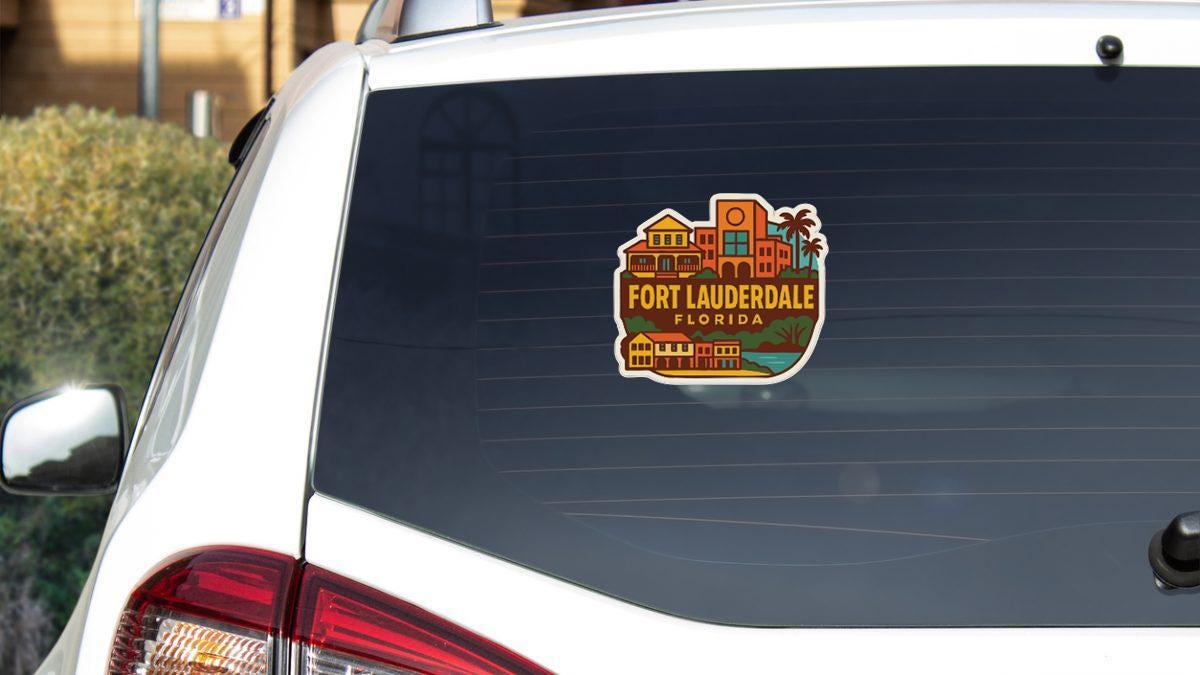 A sticker on the rear window of a white car, depicting a cityscape with buildings and palm trees, indicating the location of Fort Lauderdale, Florida.