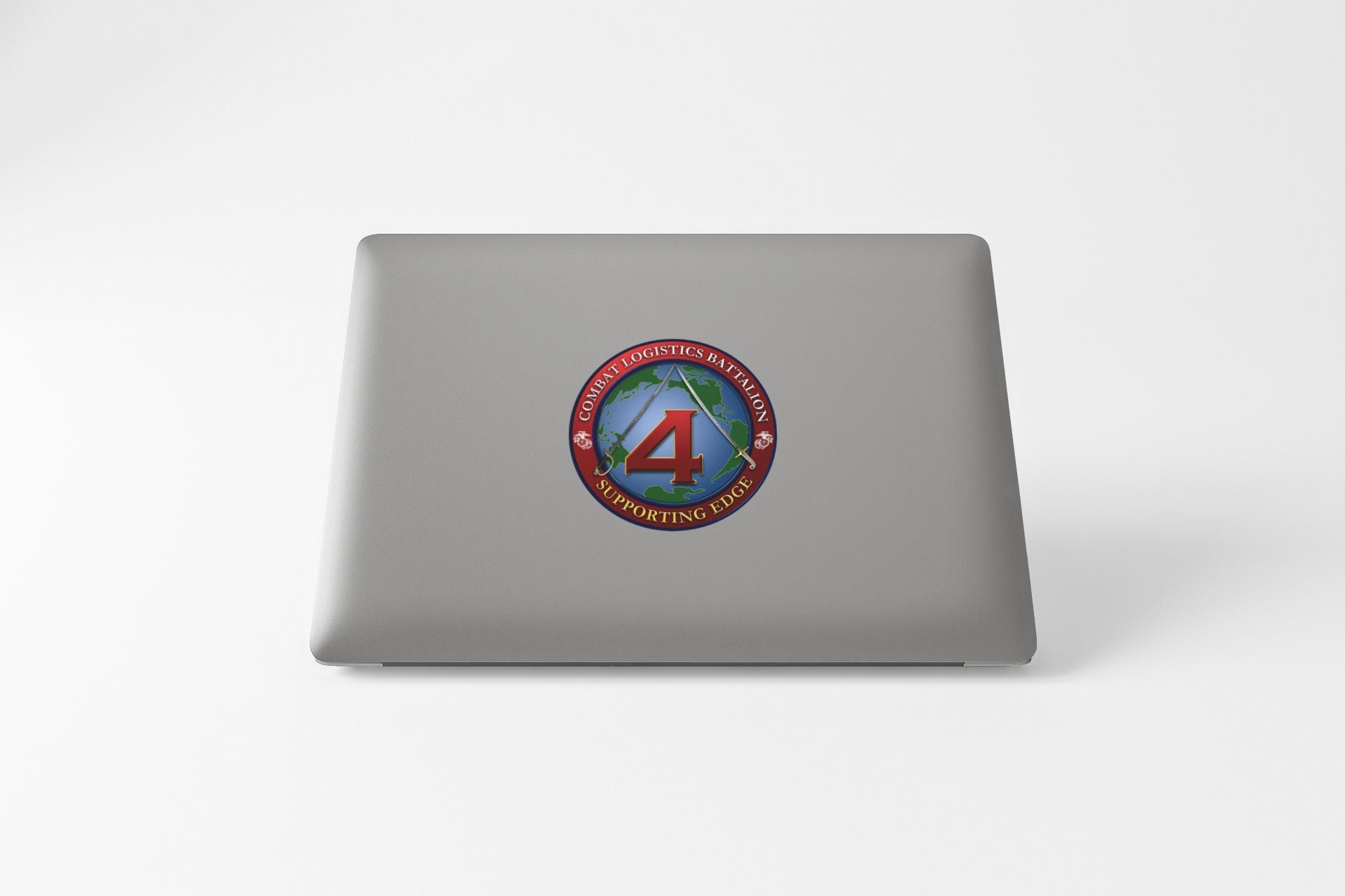a laptop computer with a sticker of a 4 on it
