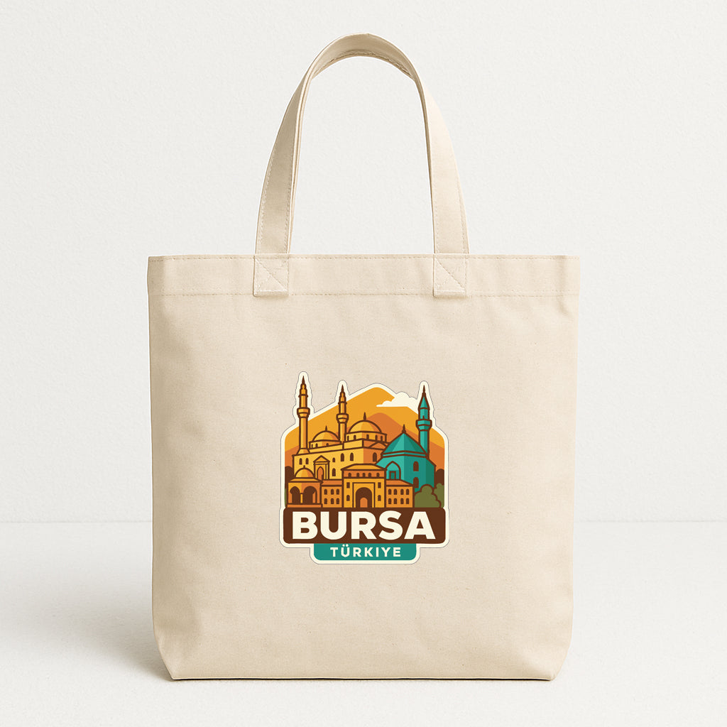 A beige tote bag with a printed design featuring the city of Istanbul, Turkey.