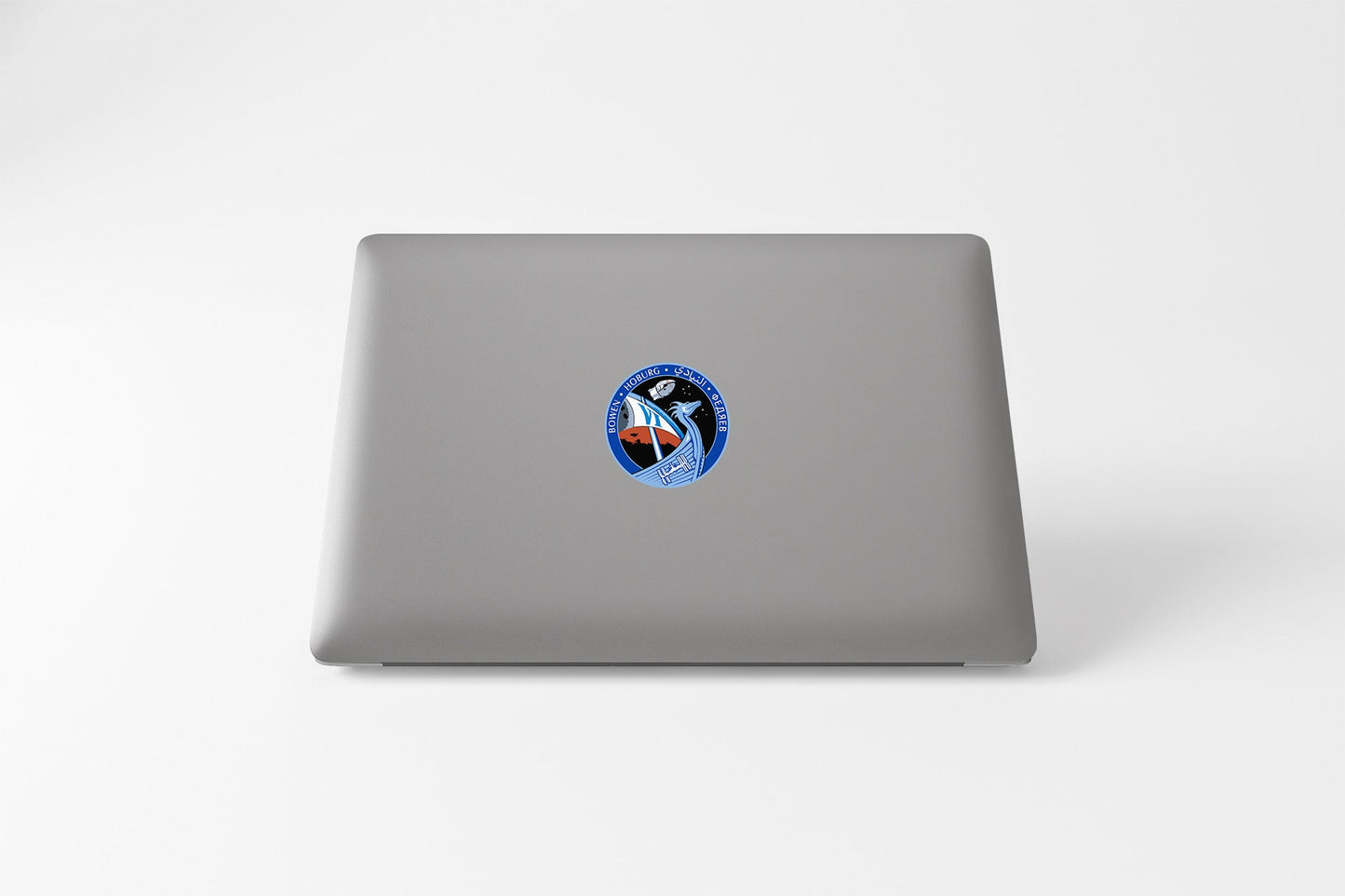 a laptop with a picture of a bird on it