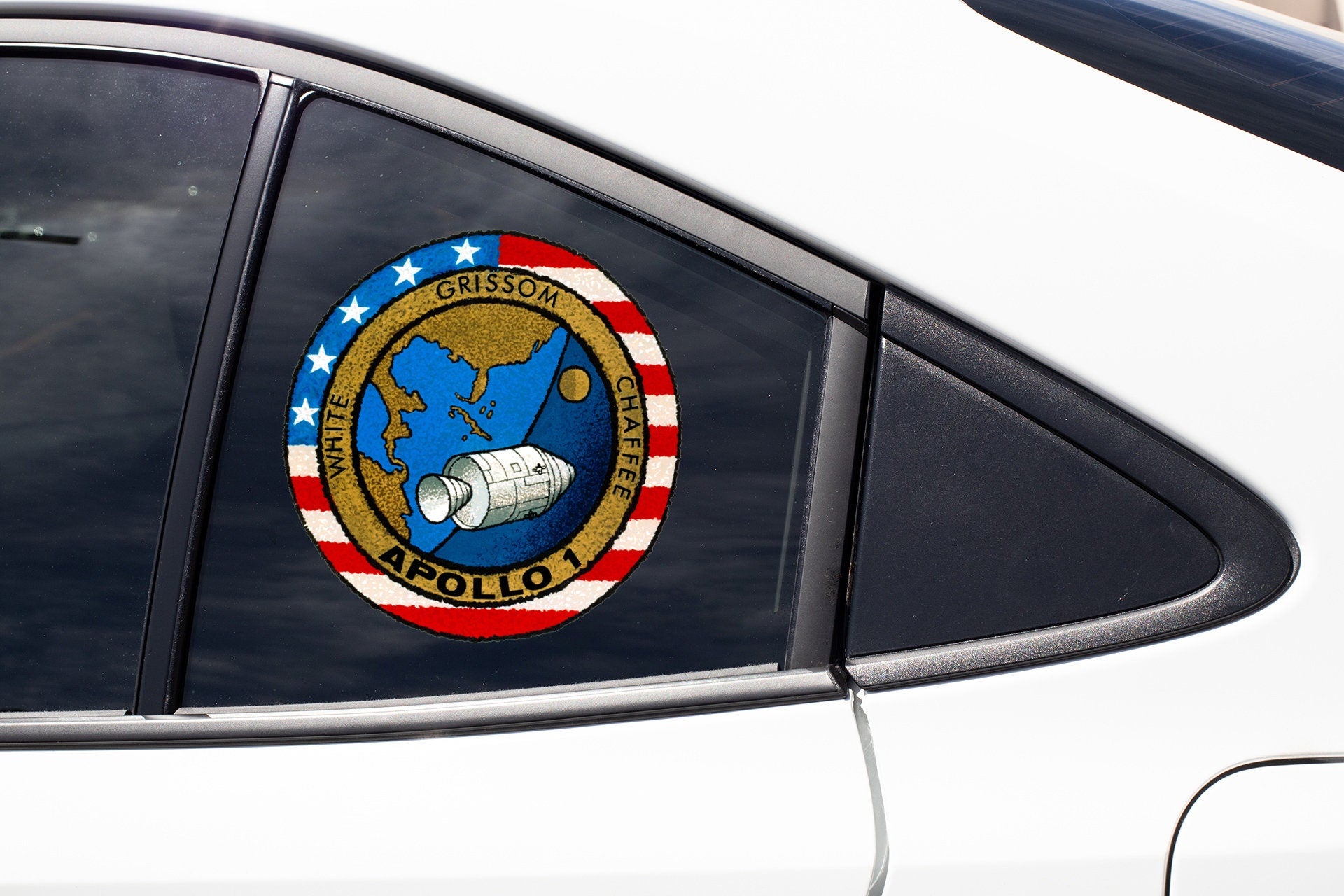 a close up of a car window with a sticker on it