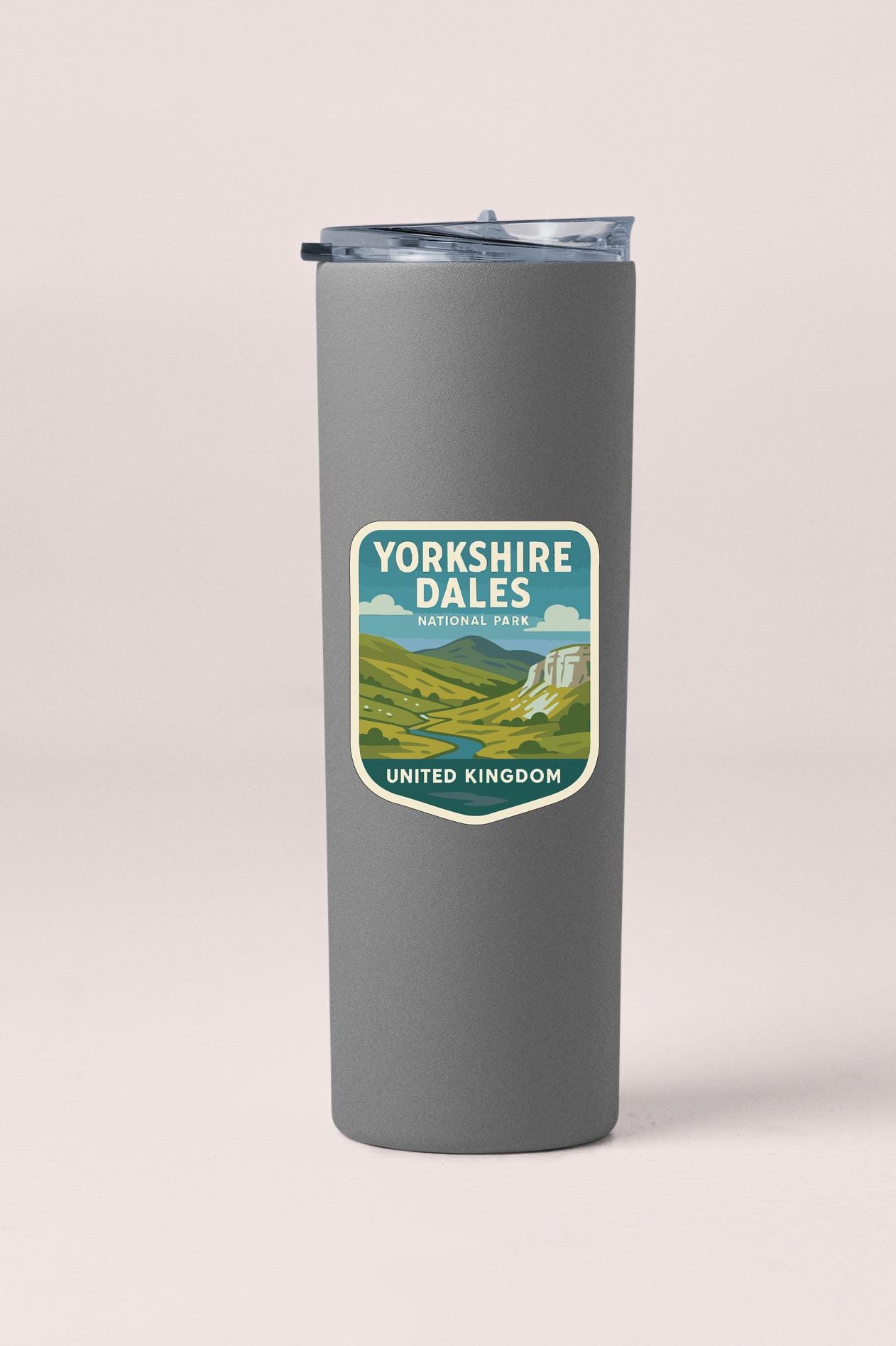 A gray insulated tumbler with a label that says "Yorkshire Dales National Park United Kingdom".