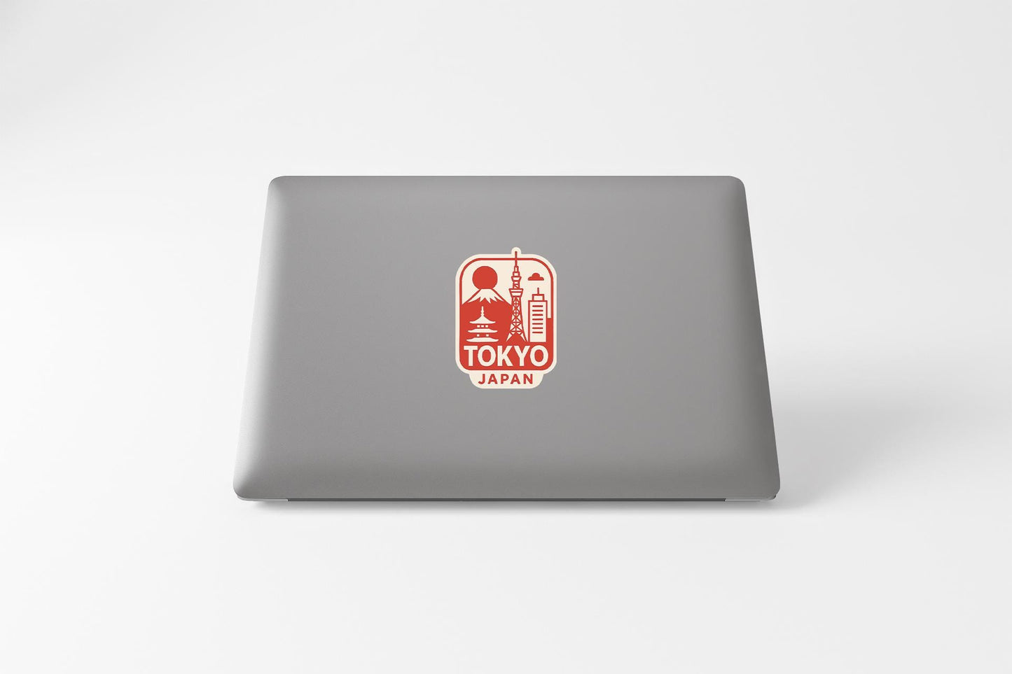 a laptop with a picture of tokyo on it