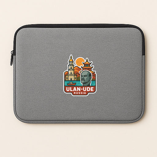 A gray laptop sleeve with a sticker depicting a man's face and the text "ULAN-UDE RUSSIA" printed on it.