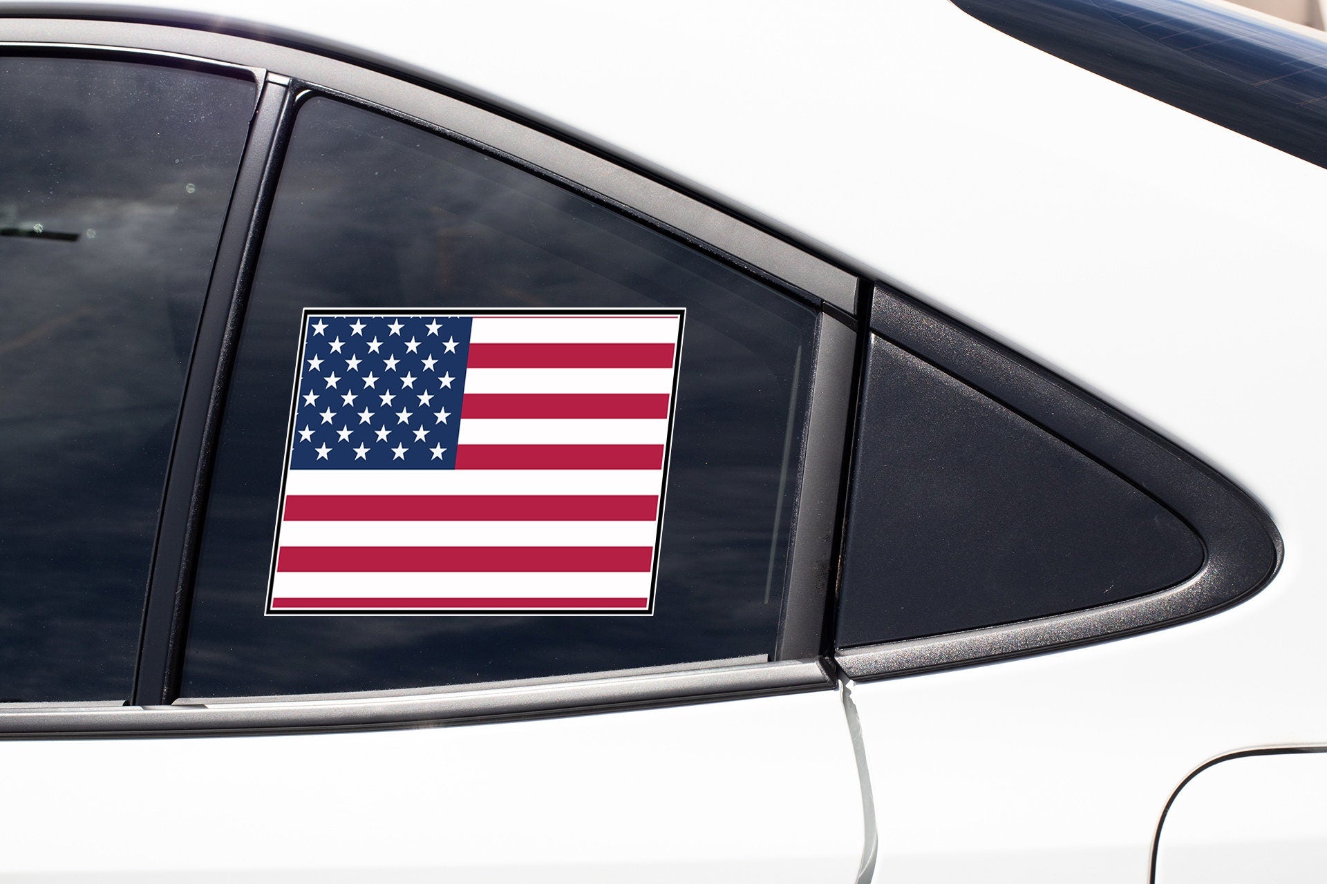 an american flag sticker on the side of a car