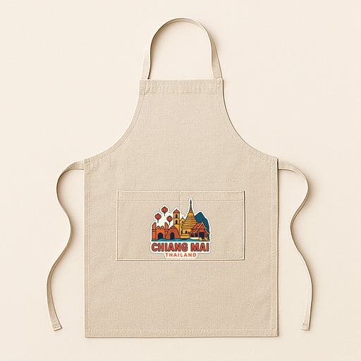 A beige apricot with a printed design of a city skyline and text that says "Chiang Mai Trail".