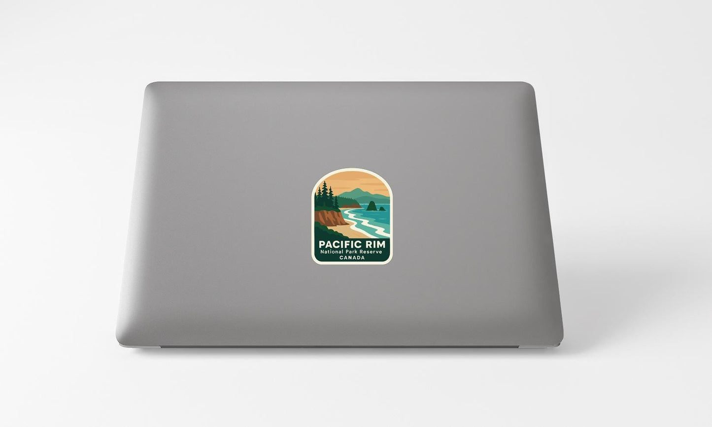 a sticker on the back of a laptop that says "Pacific Rim National Park, Canada".