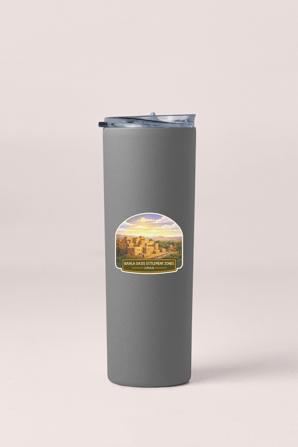 A gray cylindrical container with a lid and a label that reads "BANDA SAGA SEGMENT ZONES 1, CANA, OMAHA".