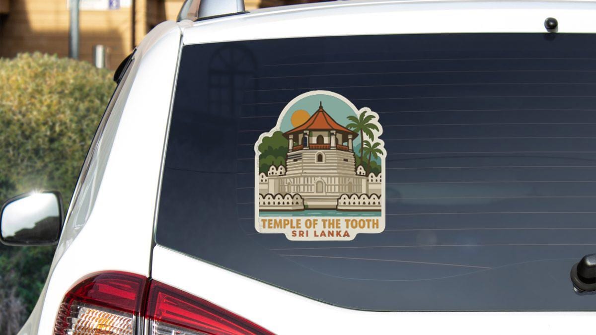 Sticker on rear window of a white car with a temple of the tooth in Sri Lanka.