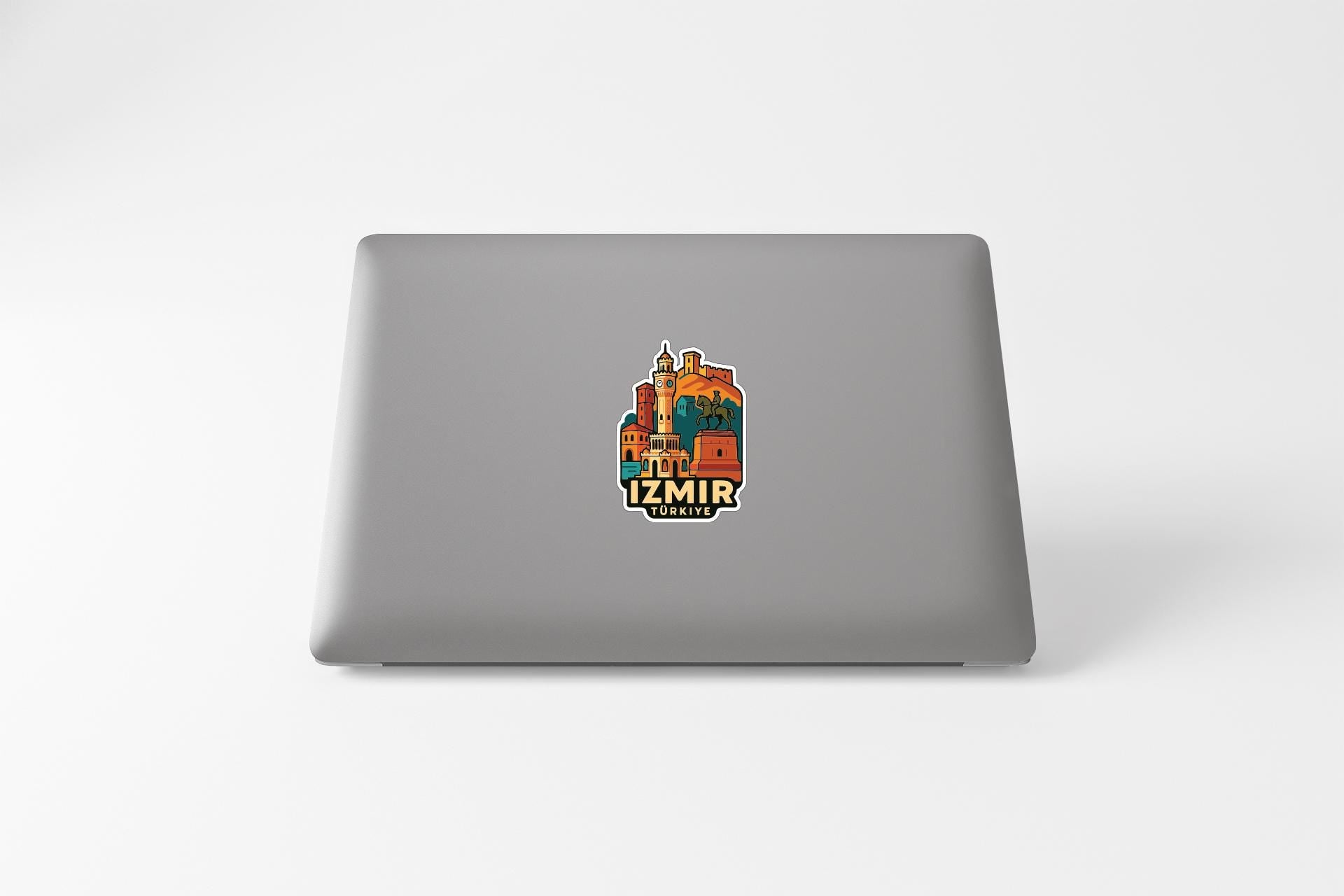 a sticker with a colorful illustration of a building and text that says "IZmir".