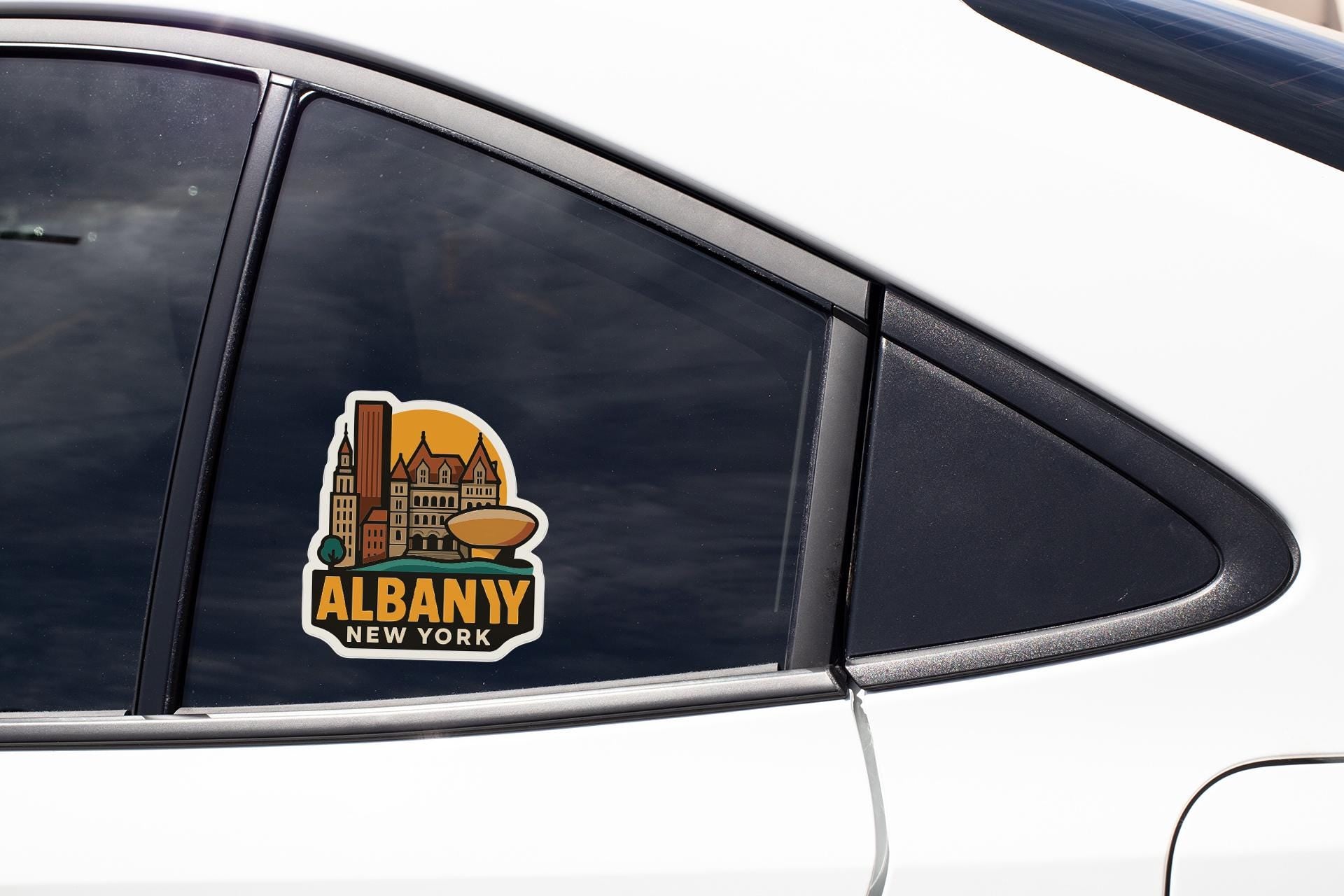 A sticker on the side of a car window that says "ALBANY NEW YORK".