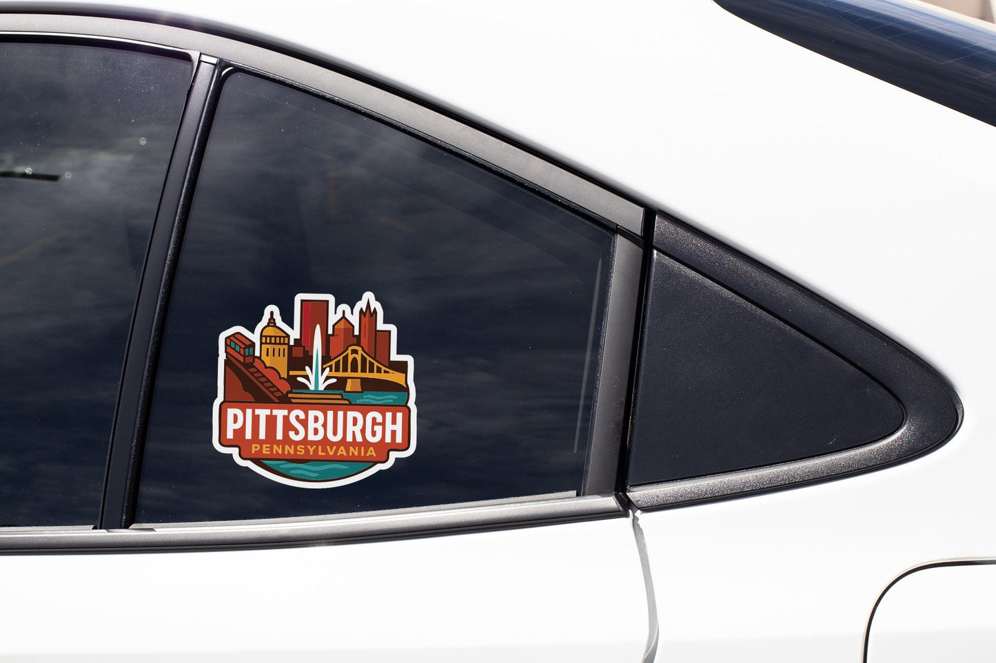 A sticker on the side of a car window that says "PITTSBURGH PENNSYLVANIA".