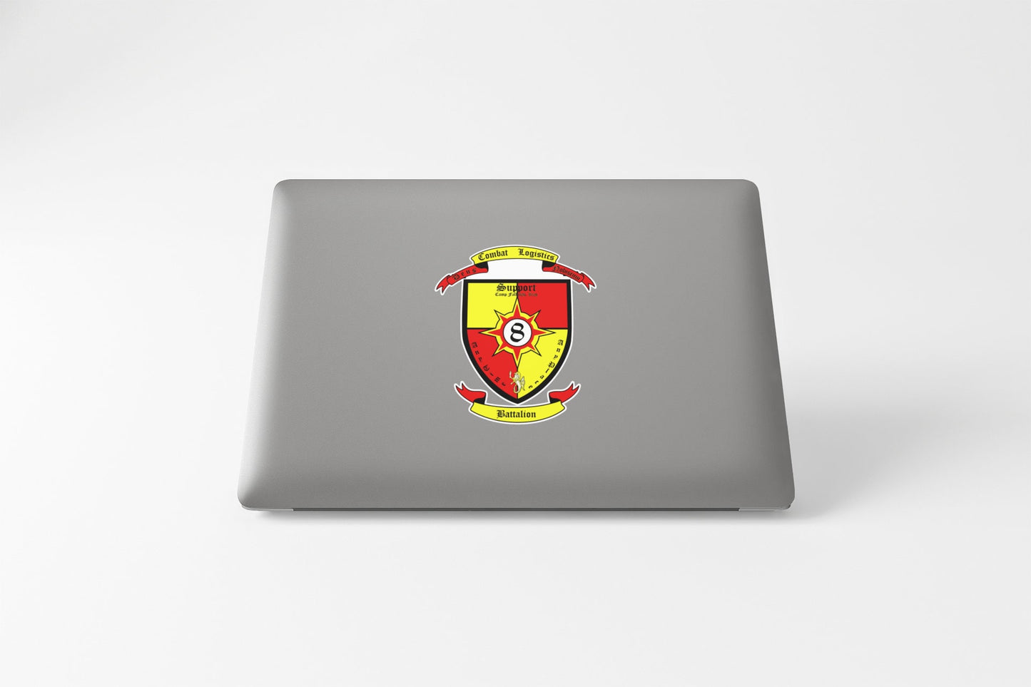 a laptop computer with a coat of arms on it