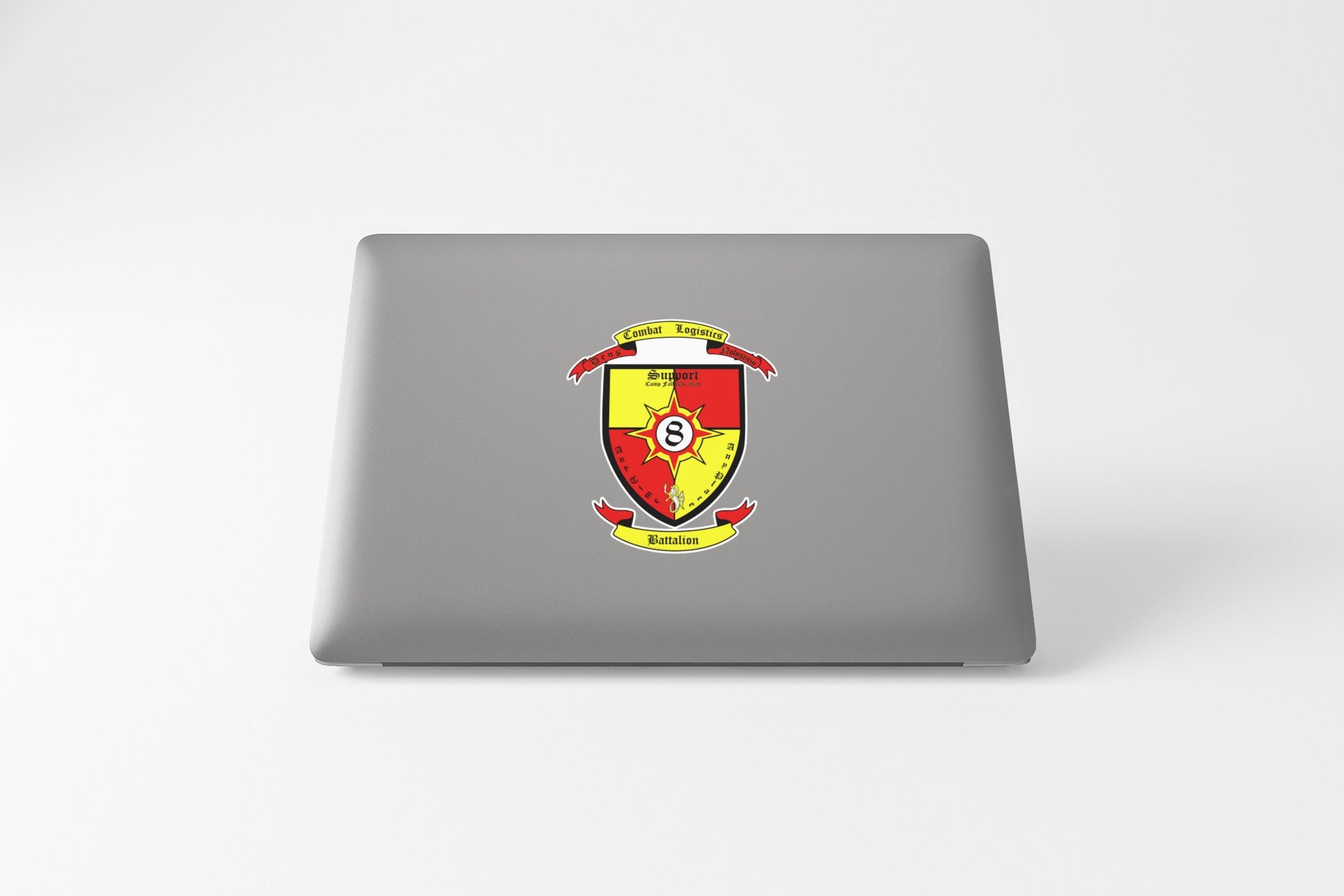 a laptop computer with a coat of arms on it