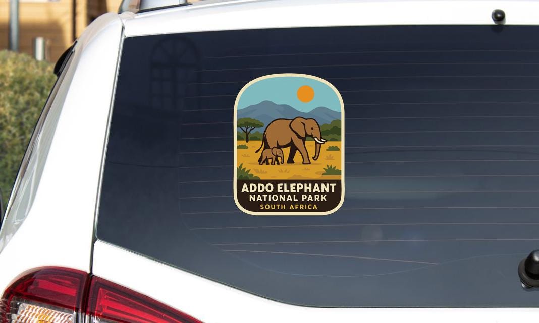 a sticker on the rear window of a vehicle, depicting an elephant and the text "Addo Elephant National Park South Africa".