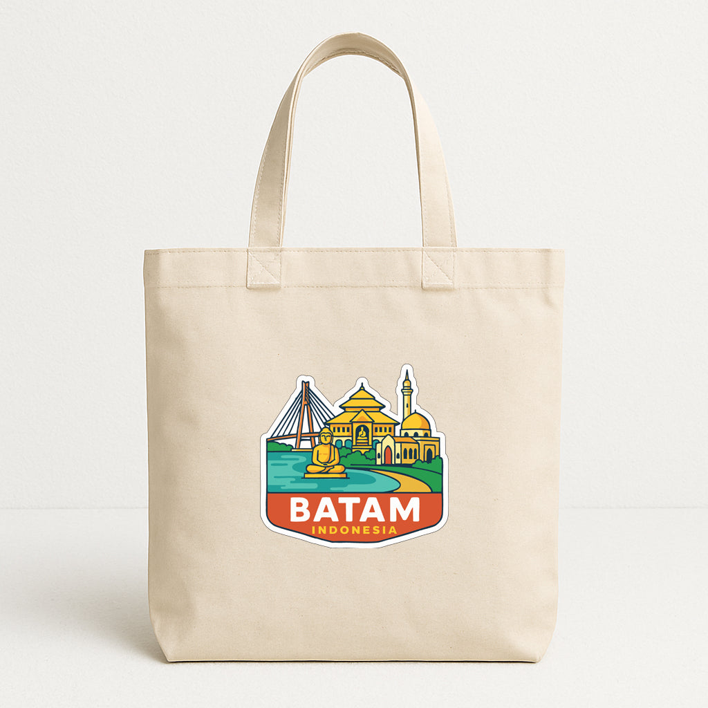 A beige tote bag with a printed design depicting the city of Batam, Indonesia.