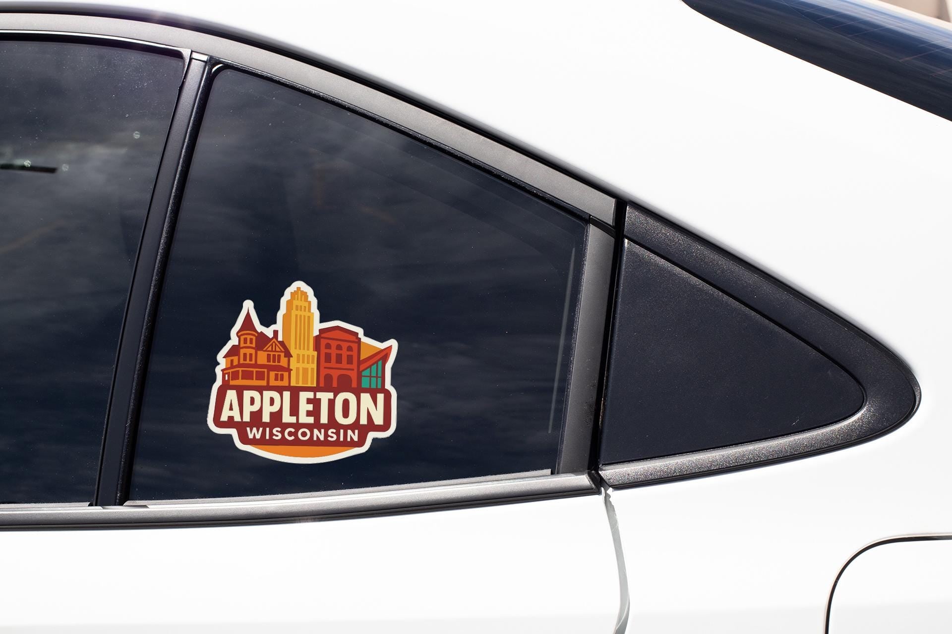 A sticker on the side of a car window that says "APPLETON WISCONSIN".