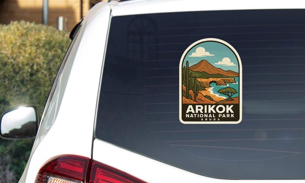 A sticker on the rear window of a car that says "ARIKOK NATIONAL PARK ARUBA".