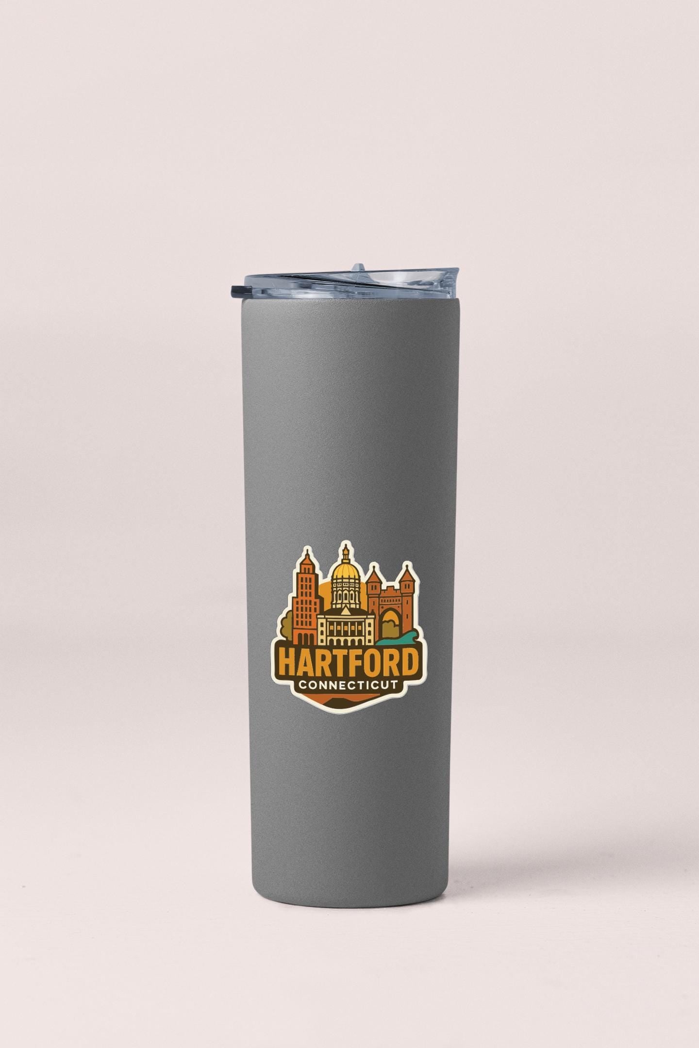 A gray insulated tumbler with a lid and a sticker featuring the image of the city of Hartford, Connecticut.