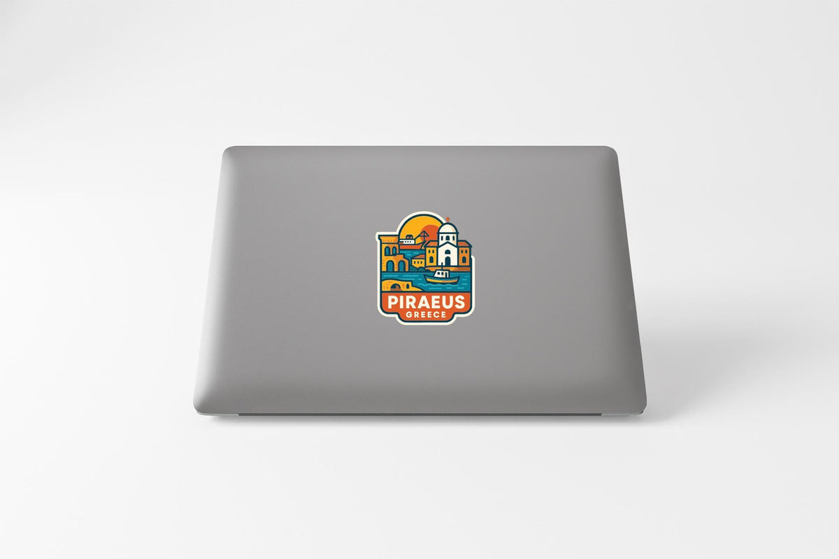 a sticker or decal of a city, likely Piraeus, Greece, on the back of a laptop computer.