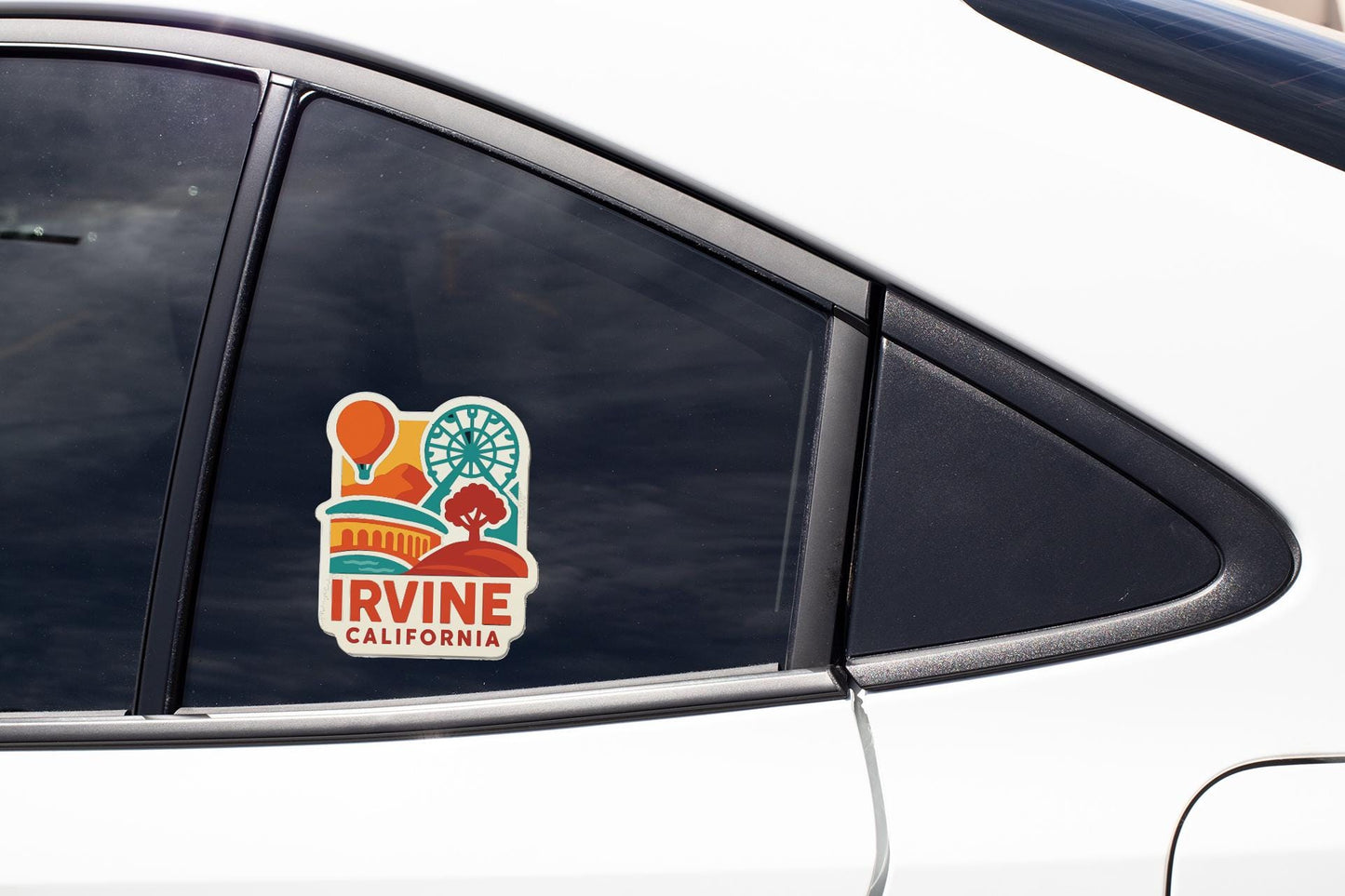 A sticker on the side of a car window that says "IRVINE, CALIFORNIA".
