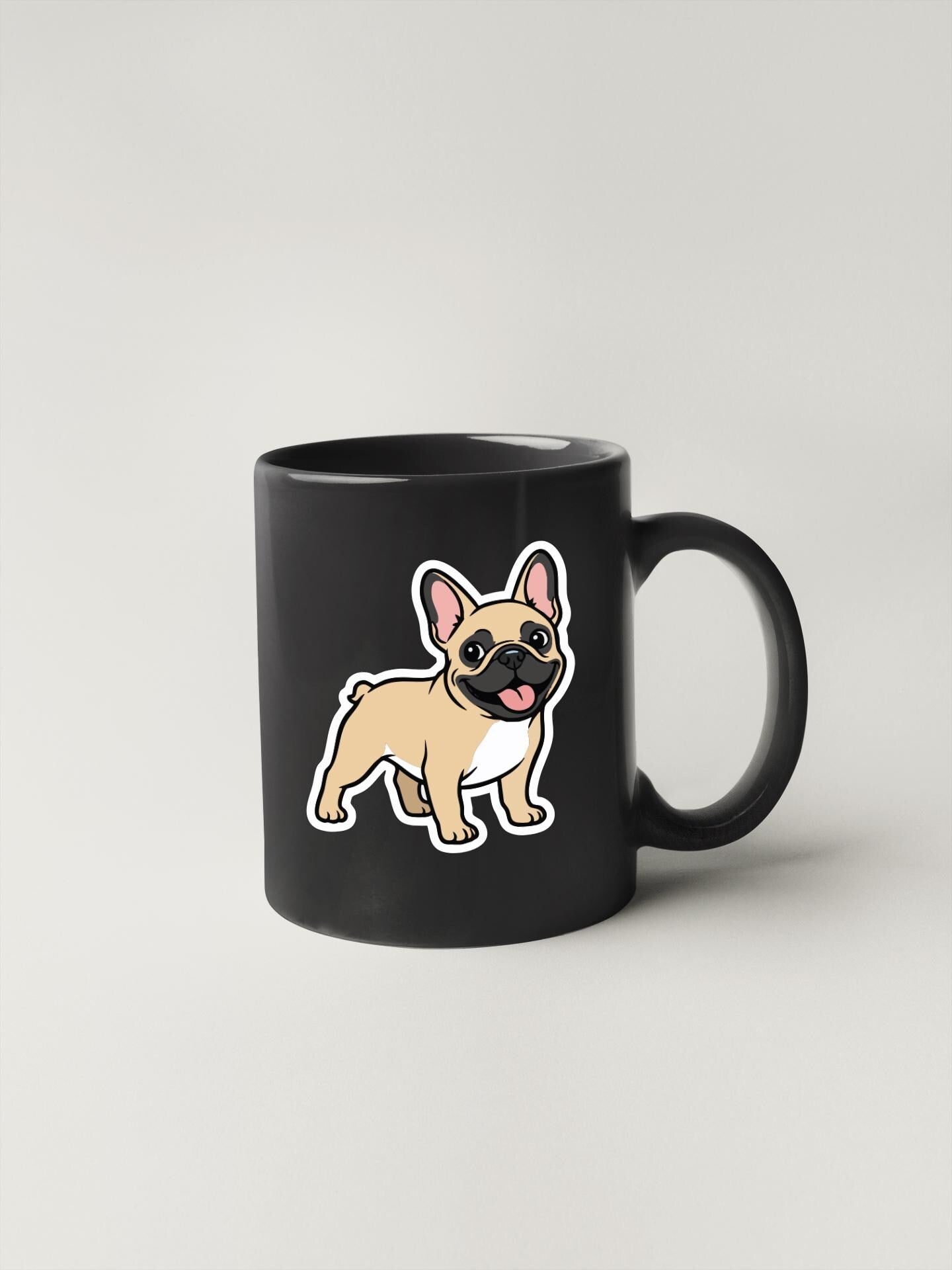 A black coffee mug with a cartoon illustration of a brown and white dog on it.