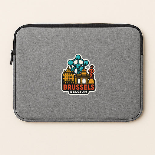 a gray laptop sleeve with a sticker of Brussels, Belgium, prominently displayed on the front.