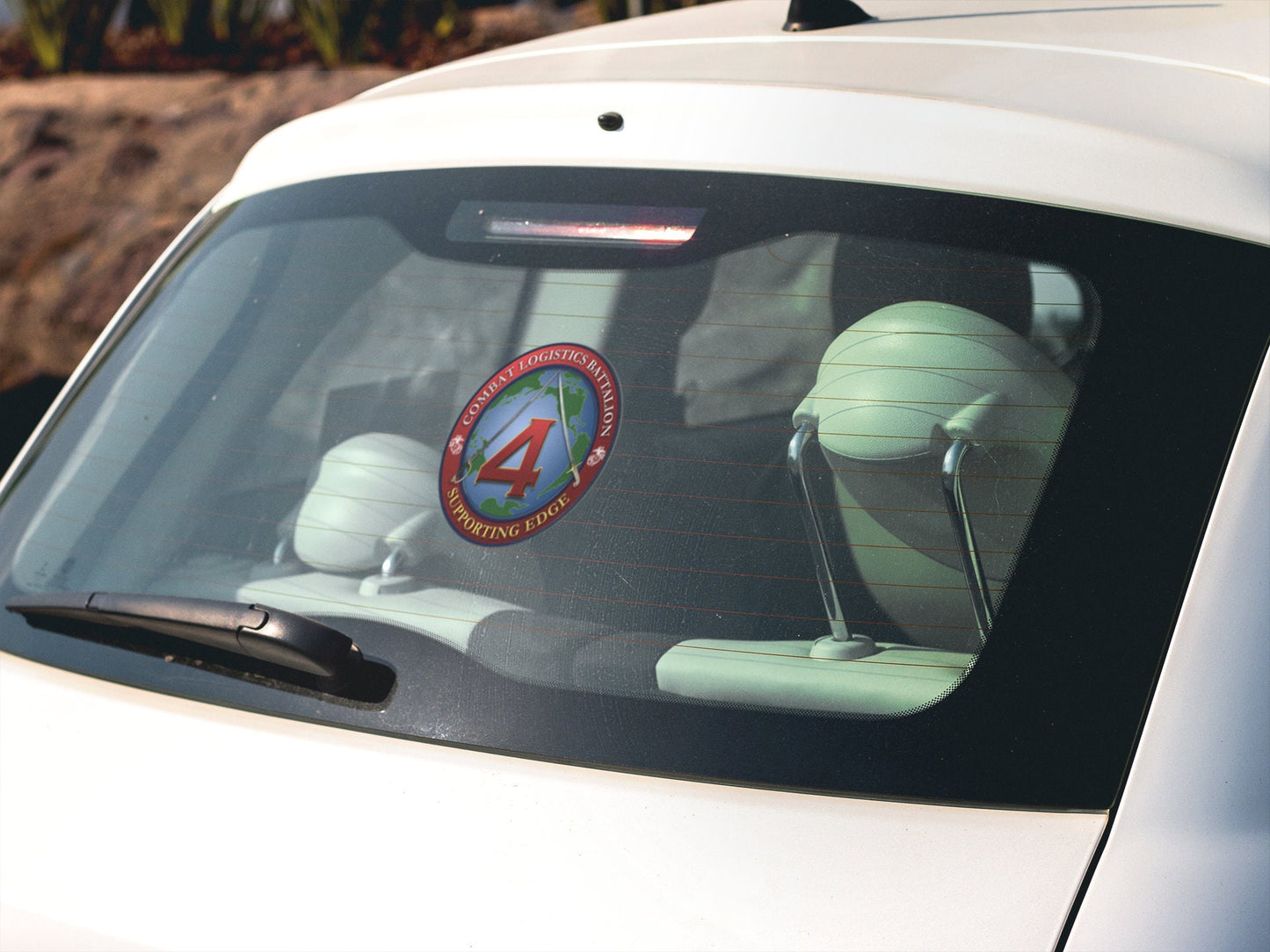 a car with a sticker on the back window